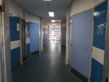 Image of corridor with cell doors at Banksia Hill Detention Centre