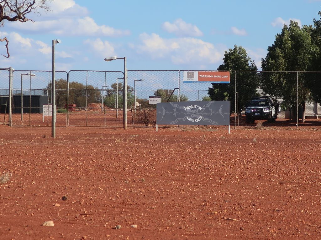 Image of the fenced and gated entrance to Warburton Work Camp